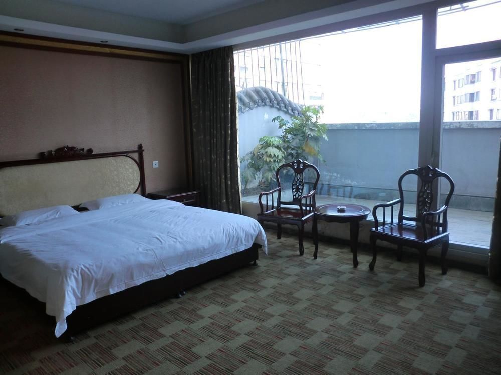 Huayu South City Hotel Wenjiang Экстерьер фото